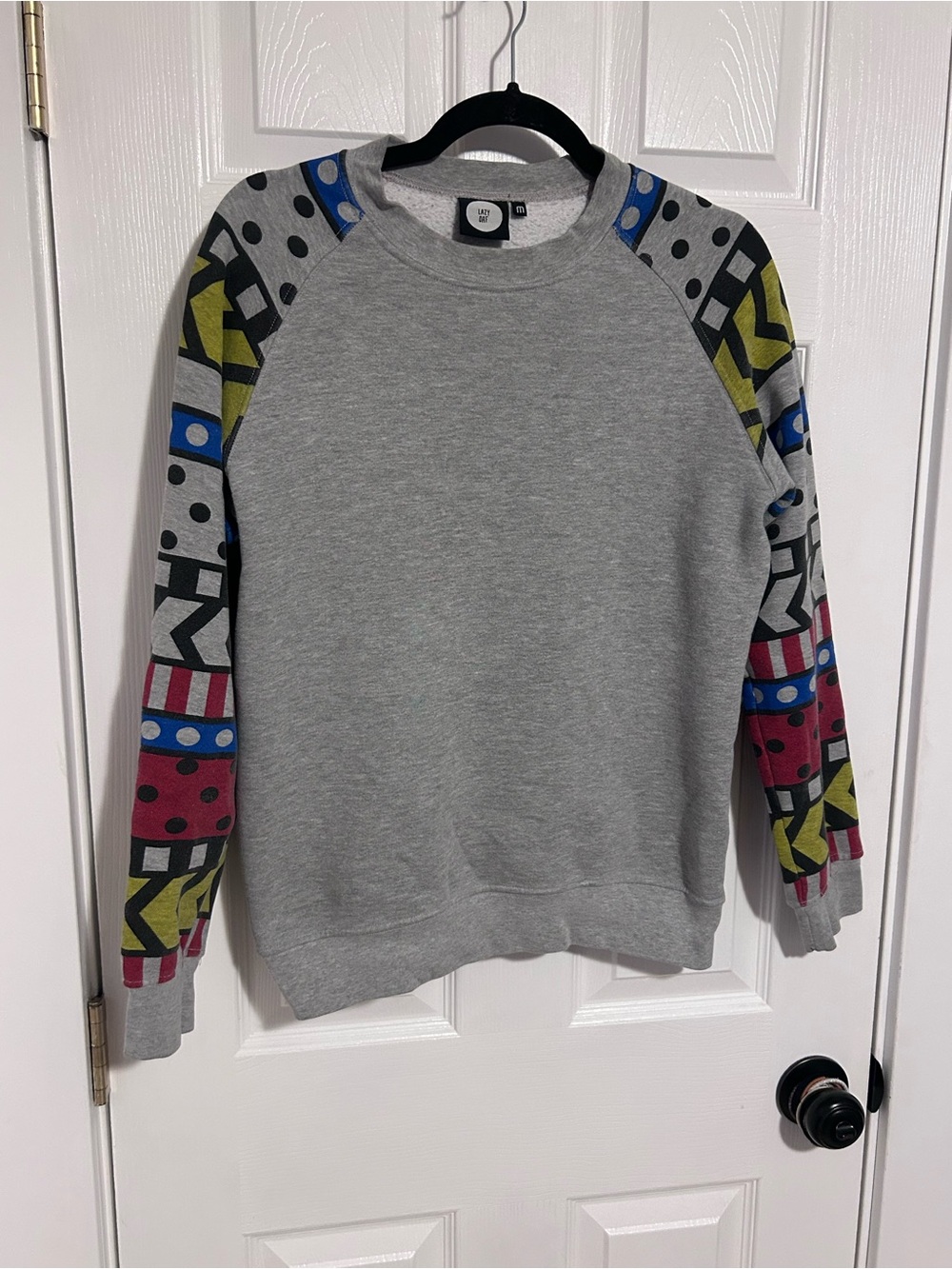 Lazy Oaf Gray Crewneck Sweatshirt with Multicolor Graphic Raglan Sleeves